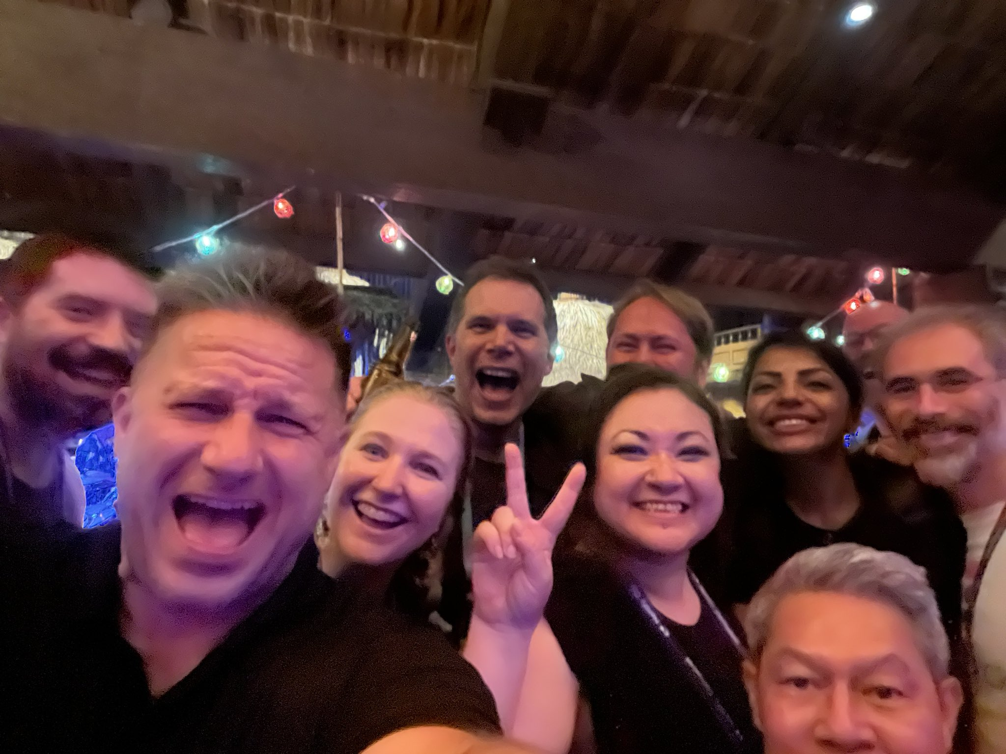 Hanging in the Tonga room with our waiter at Netlify Compose 2024